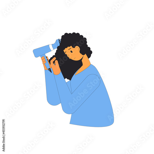 Portrait of woman blow dry curly hair.