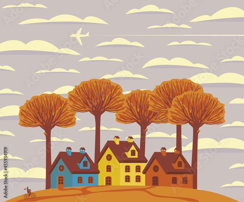 Autumn landscape with yellowed trees, cute colored houses on an orange hill and flying plane in a cloudy sky. Decorative fall vector illustration in cartoon style