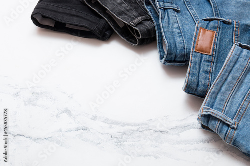 Different types of jeans. Jeans of different colors. Jeans texture.