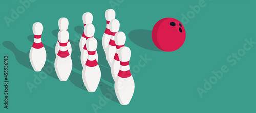 skittles and bowling ball standing on bowling floor