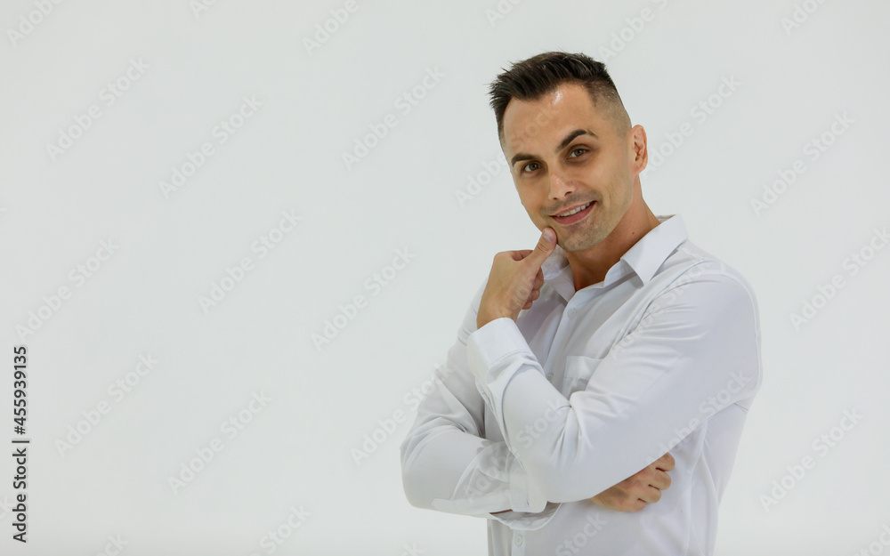 Isolated portrait close up studio shot of Caucasian happy handsome smart confident professional successful businessman entrepreneur in long sleeve shirt stand smile look at camera on white background Isolated portrait close up studio shot of Caucasian happy handsome smart confident professional successful businessman entrepreneur in long sleeve shirt stand smile look at camera on white background