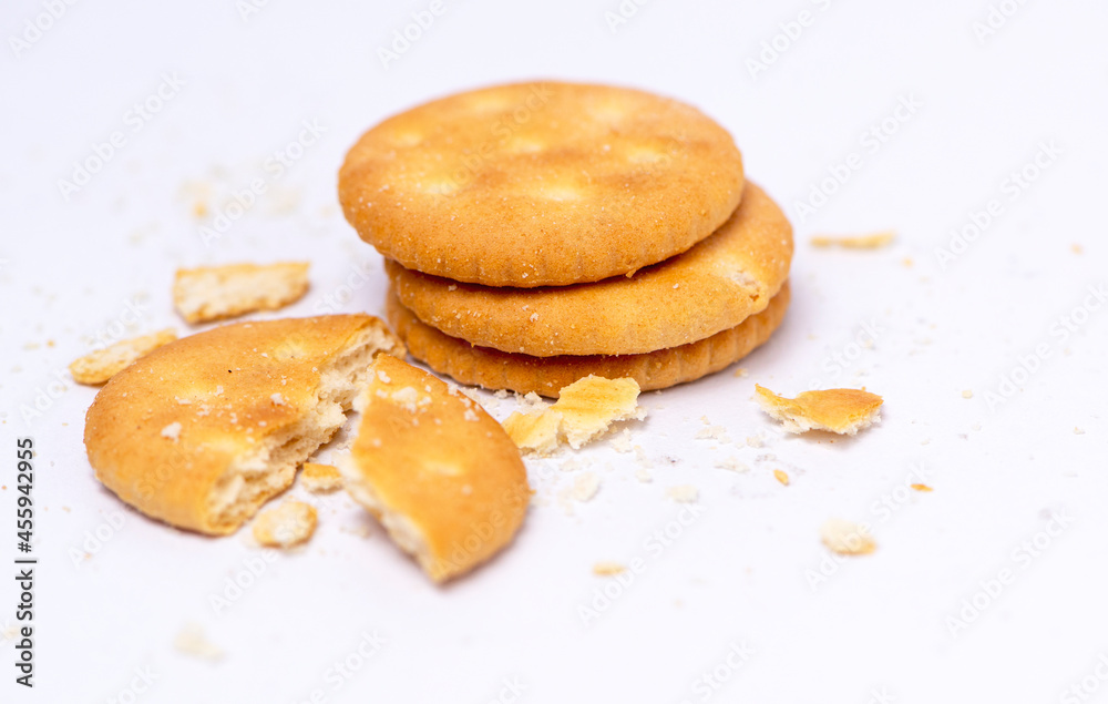 biscuits with crumbs isolated on white background
