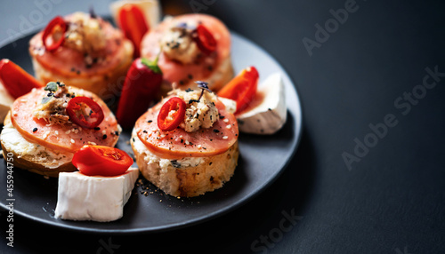 Wallpaper Mural Open face sandwiches stuffed fish, cream cheese, tomato, chili pepper and sesame seed. Smorrebrod traditional Danish sandwich, shallow focus, close up. Torontodigital.ca
