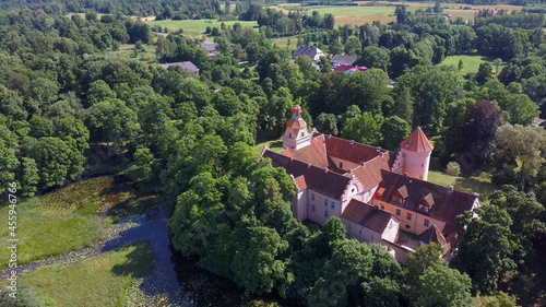 Edole Castle in Latvia, Courland (Kurzeme), Western Latvia. History, Architecture, Travel Destinations, National Landmark. Aerial View of Edole Medieval Castle Build in Neogothic Style  photo