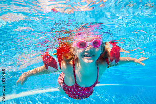 little girl in pool © yanlev