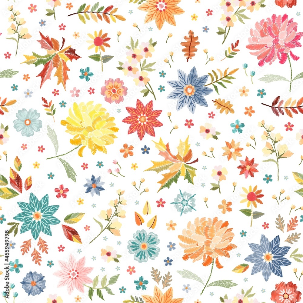 Embroidered floral design. Seamless vector pattern with colorful flowers and leaves on white background. Swatch for textile.