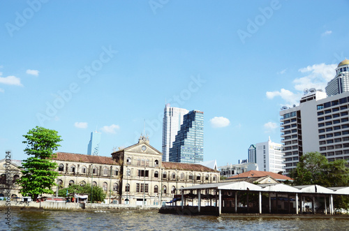 THAILAND, BANGKOK: Scenic cityscape view of architecture along the riverside with old traditional buildings and modern skyscrapers