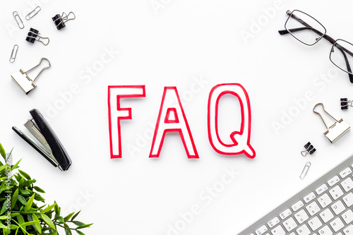 Business concept faq frequently asked questions with keyboard