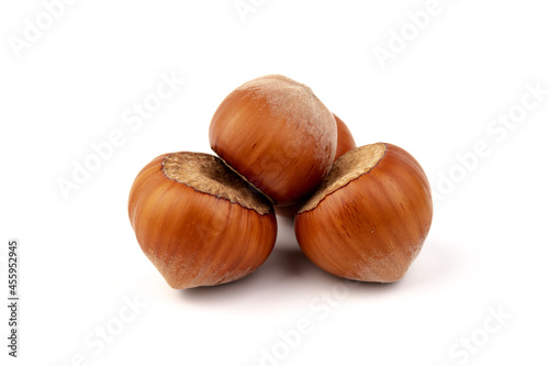 Group of hazelnuts, isolated on white background