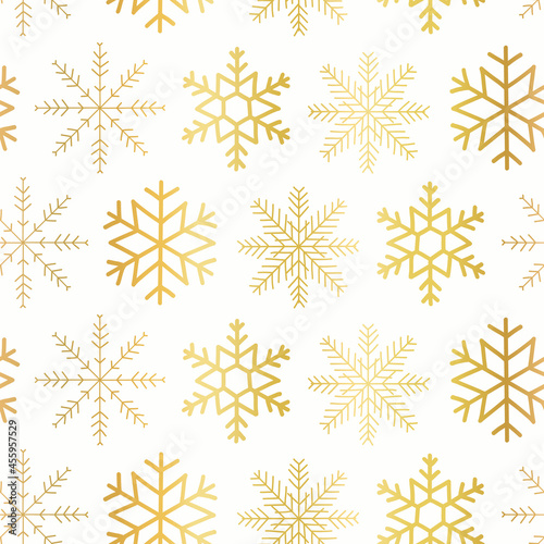 Vector seamless pattern Gold foil snowflakes on white background. Faux shiny golden metallic snowflake pattern repeat. Elegant Christmas wrapping paper, gift wrap, gift bag, holiday card, invitations