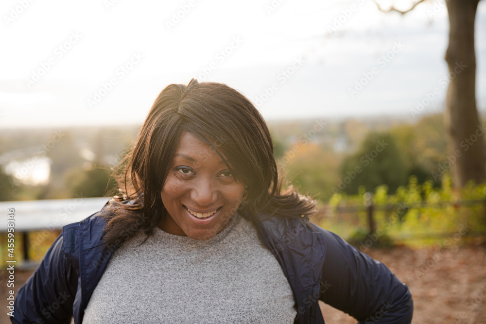 Portrait smiling senior woman in autumn park