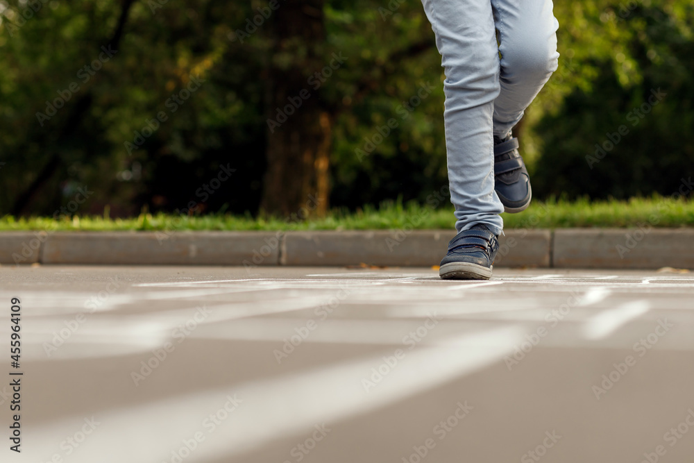 Kids playing hopscotch on playground outdoors. Hopscotch popular street game.