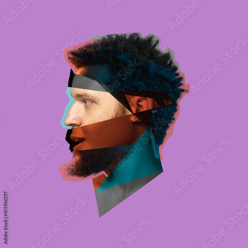 Contemporary art colllage of male head with different face pieces isolated over purple background. Concept of nations and gender equality photo