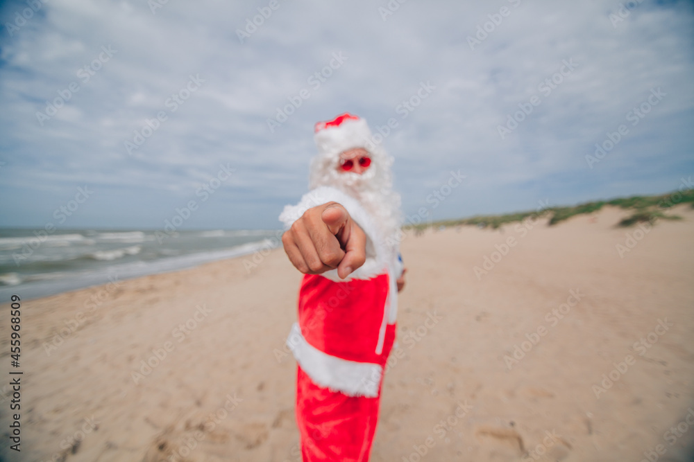 santa klaus making the we want you gesture pointing finger at camera - focus on finger santa klaus making the we want you gesture pointing finger at camera - focus on finger
