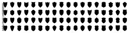 Set of flat silhouette icons of protective shields. Knightly military shield insignia of different shapes. Vector elements.
