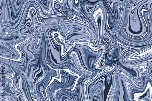 Marble effect texture of different blue colors with contrasting transitions. Background concept of bright wallpaper with copy space