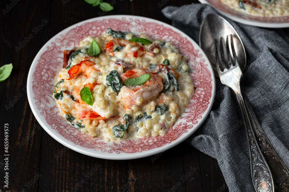 ptitim pasta with shrimp, dried tomatoes, spinach ptitim pasta with shrimp, dried tomatoes, spinach