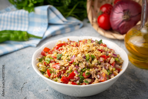 Traditional delicious Turkish cuisine, salad with tomatoes, cucumbers (Turkish name; Gavurdagi salata) photo