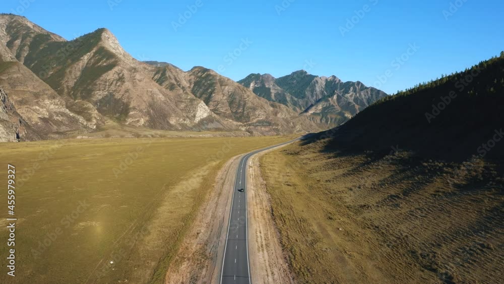 Vehicles Driving Along Asphalt Highway Background Rocky Mountains At Summer Day Vehicles Driving Along Asphalt Highway Background Rocky Mountains At Summer Day
