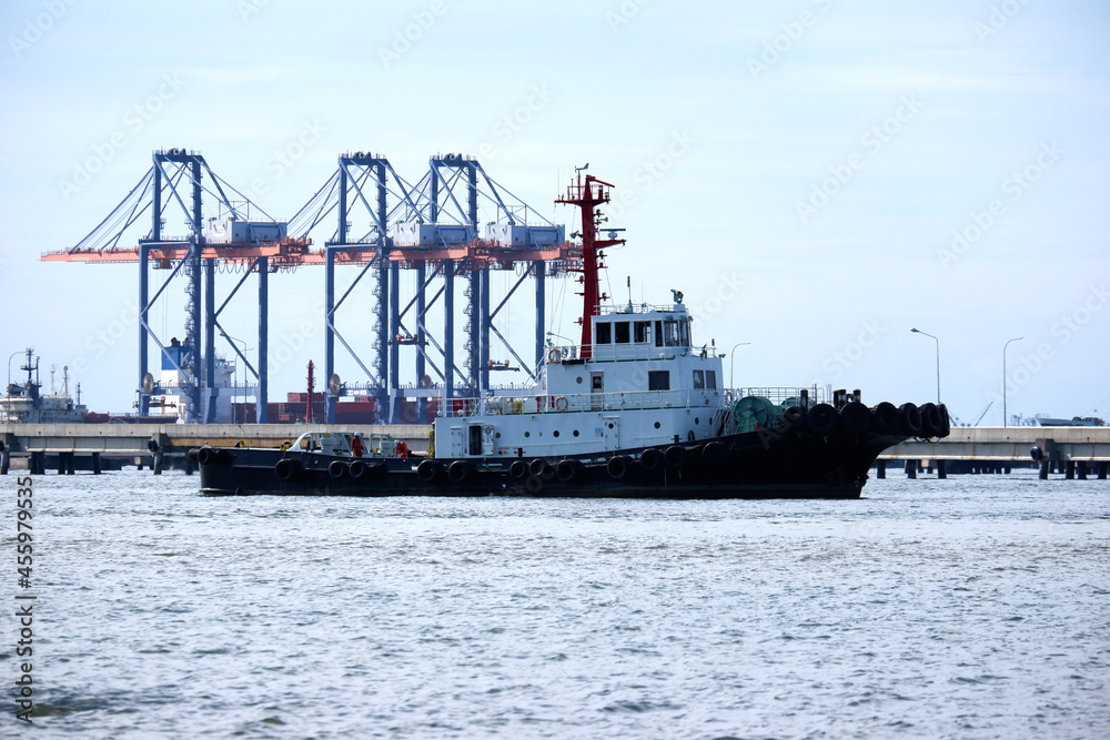 Tug boat with container crane