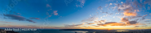 Canvas Print Panoramic view of the amazing sunset sky over the sea.