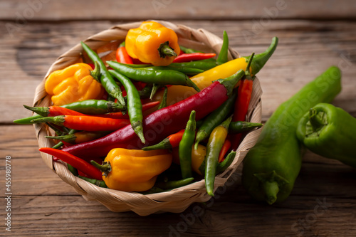 Colorful hot peppers on woo...