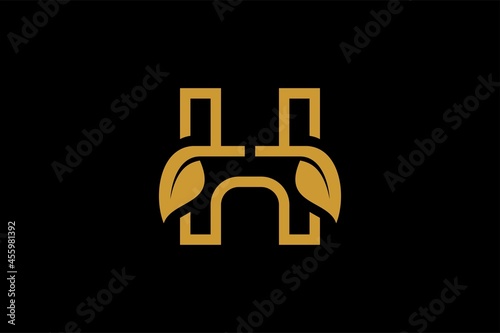 Letter H and leaf logo design vector. Natural and type logo design.