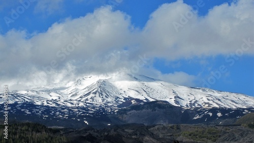 View of snow-capped Mount Etna volcano.