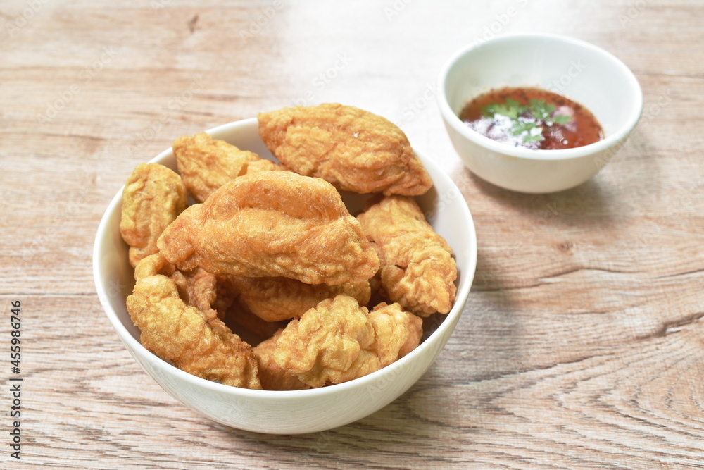 deep fried fish ball dressing chili sauce on bowl deep fried fish ball dressing chili sauce on bowl