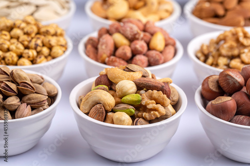 Mixed nuts on a white backg...