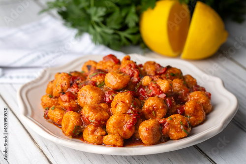 Traditional delicious Turkish food; bulgur garlic meatball (Turkish name; Sarimsakli bulgur kofte or Fellah koftesi) photo