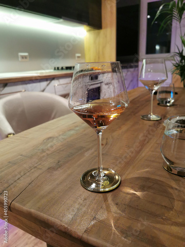 Relaxing evening at home after work with a glass of wine