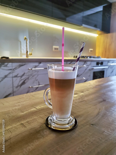 Latte Macchiato Coffee Cup on wooden table