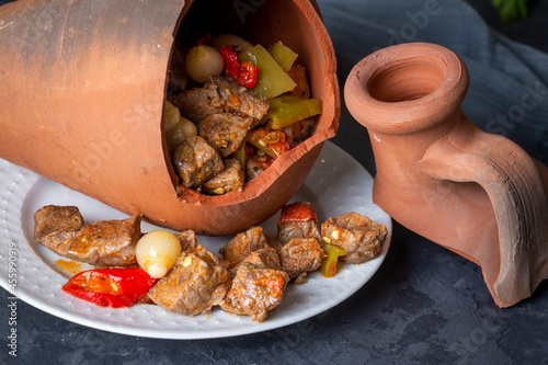 Authentic Turkish Testi Kebab cooked in earthenware waterjug, Turkish name; Testi kebabi photo