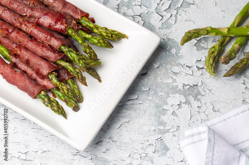 Grilled asparagus with bacon (Turkish name; Pastirmali kuskonmaz ızgara) photo