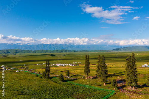 Green grassland and mountain natural landscape in Nalati grassland,Xinjiang,China.Aerial view. photo