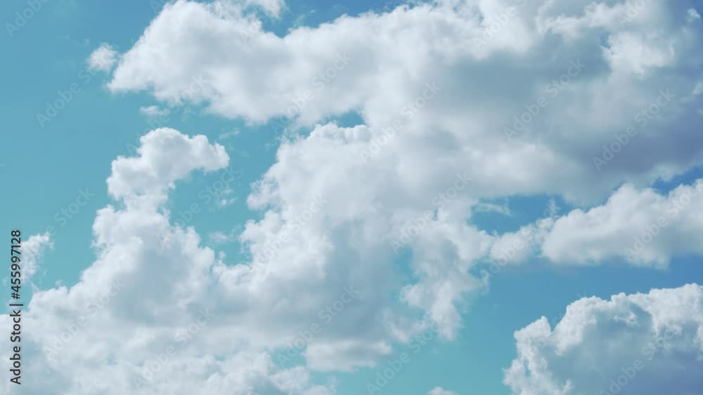 Time Lapse of 4K White Cumulus Clouds in Azure Clear Sky. Beautiful View of Puffy Clouds in a Blue Sky in Sunny Weather During The Day, Timelapse. Cloudy Summer Skyscraper. Air, Altitude, Climate. Time Lapse of 4K White Cumulus Clouds in Azure Clear Sky. Beautiful View of Puffy Clouds in a Blue Sky in Sunny Weather During The Day, Timelapse. Cloudy Summer Skyscraper. Air, Altitude, Climate.