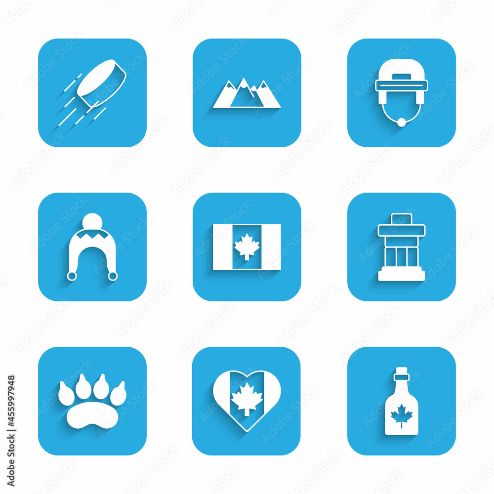 Set Flag of Canada, Heart shaped flag, Bottle maple syrup, Inukshuk, Bear paw footprint, Winter hat, Hockey helmet and puck icon. Vector Set Flag of Canada, Heart shaped flag, Bottle maple syrup, Inukshuk, Bear paw footprint, Winter hat, Hockey helmet and puck icon. Vector