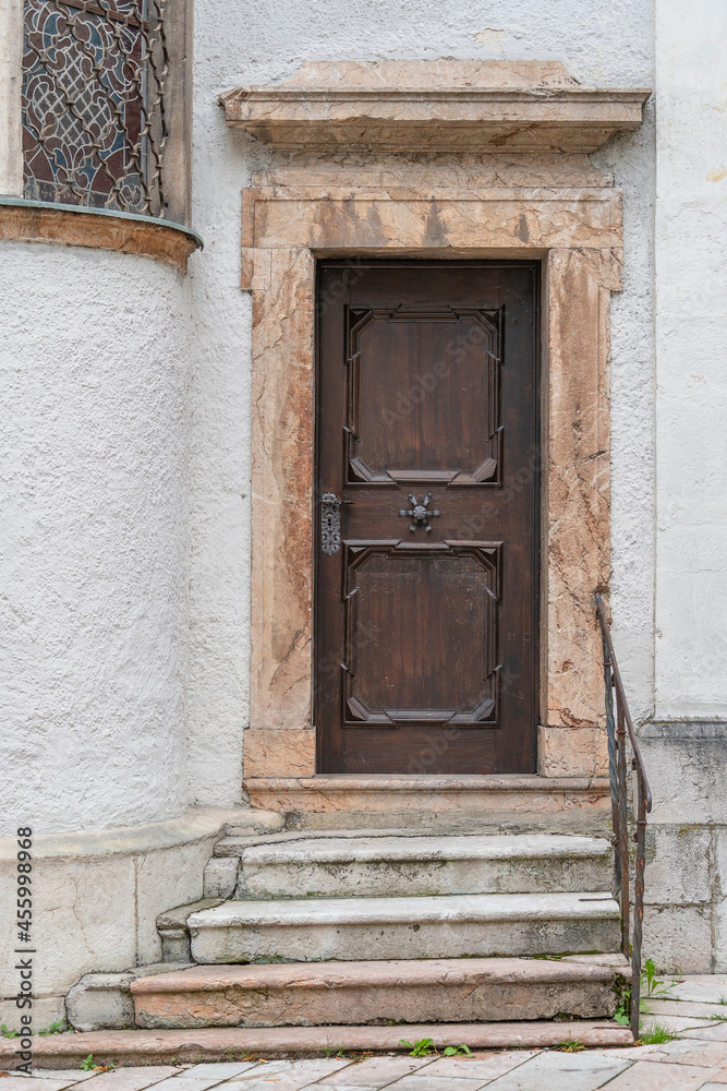 Detail of an ancient wooden door in Salzkammergut, Austria, close up