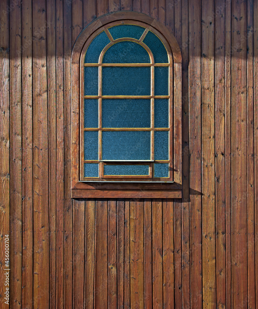 General view and architectural details of the belfry and the wooden Catholic church of St. Andrew Bobola built in 1938 in the village of Skierkowizna in Mazovia, Poland. General view and architectural details of the belfry and the wooden Catholic church of St. Andrew Bobola built in 1938 in the village of Skierkowizna in Mazovia, Poland.