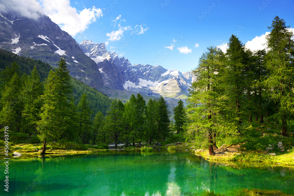 View of the lake Lago Blu near Breuil-Cervinia, Val D'Aosta,Italy. Beautiful mountain landscape in sunny day.