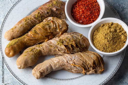 Traditional Turkish Stuffed rice tripe or offal food on the table in Turkish Restaurant. Shirdan Dolma is the favorite food Adana city of Turkey. (Turkish name; Sirdan) photo