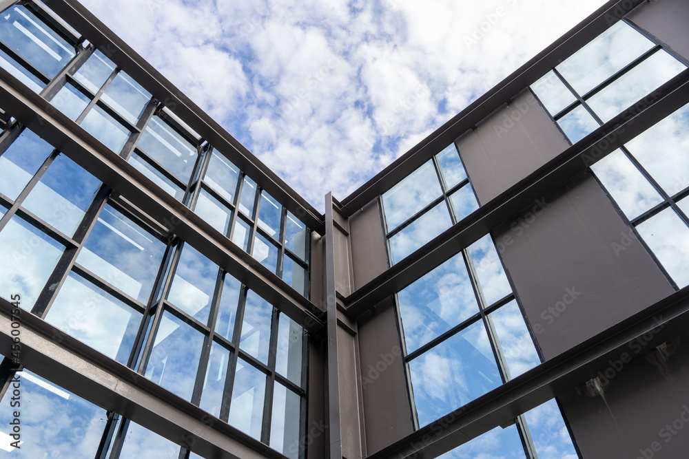 Wall structure made of steel and glass on the deck of a tall building Wall structure made of steel and glass on the deck of a tall building
