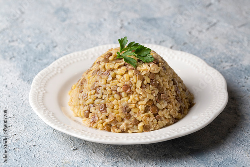 Traditional delicious Turkish foods; bulgur pilaf with green lentils (Turkish name; yesil mercimekli bulgur pilavi) photo