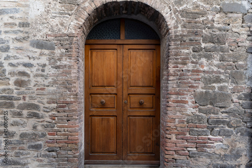 old wooden door in wall