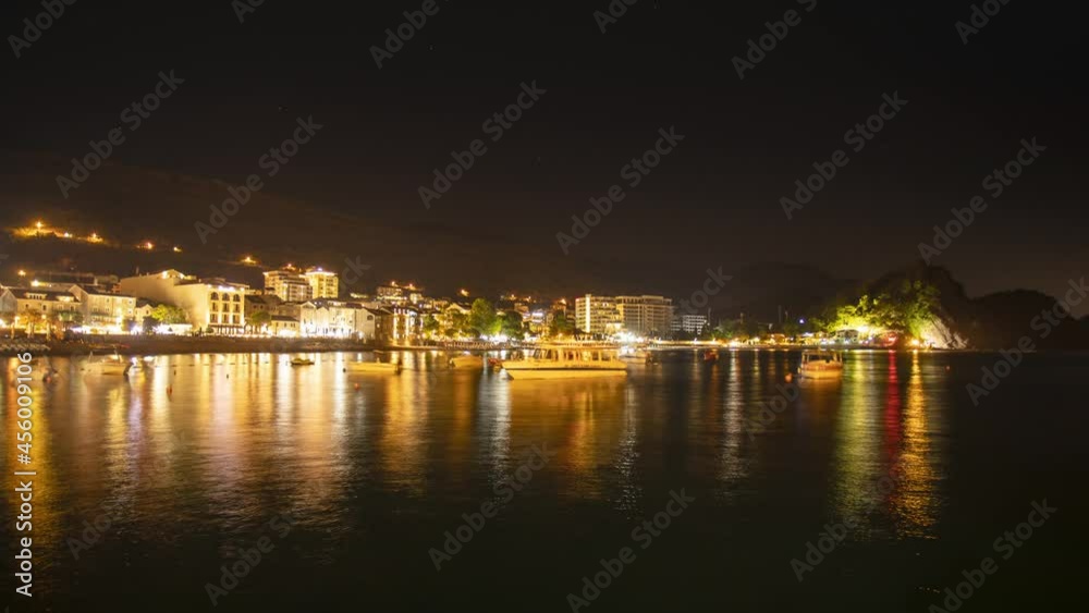 Relaxation on beach, seaside resort with people and boats moving time lapse video. Petrovac Montenegro. Relaxation on beach, seaside resort with people and boats moving time lapse video. Petrovac Montenegro.