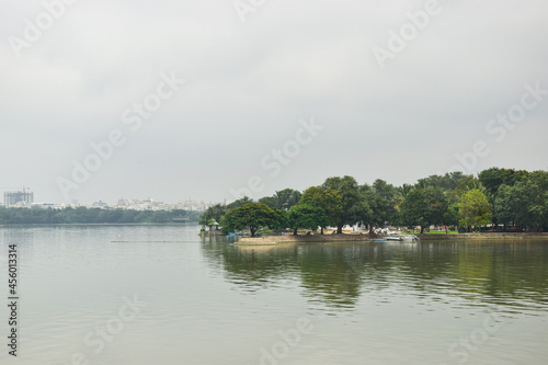 Wallpaper Mural Flying Indian Flag at Water lake and Green Trees Blue Sky Landscape  Torontodigital.ca