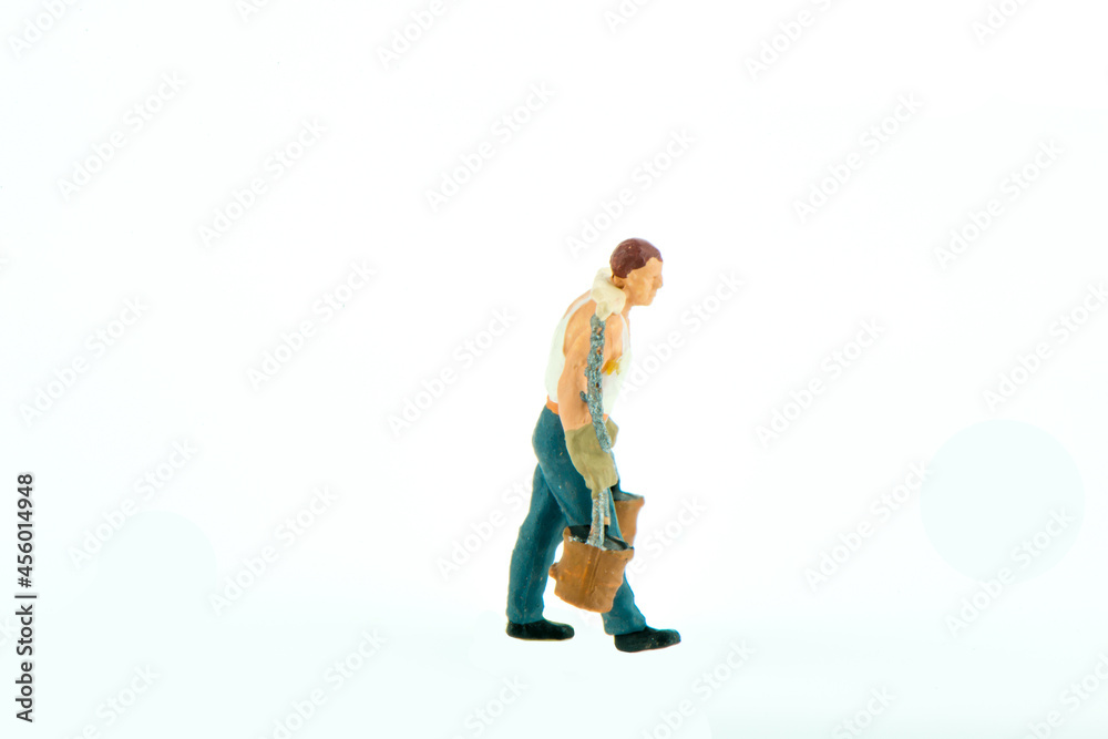 Miniature people office, worker, and farming concept in variety action on white background with space for text Miniature people office, worker, and farming concept in variety action on white background with space for text