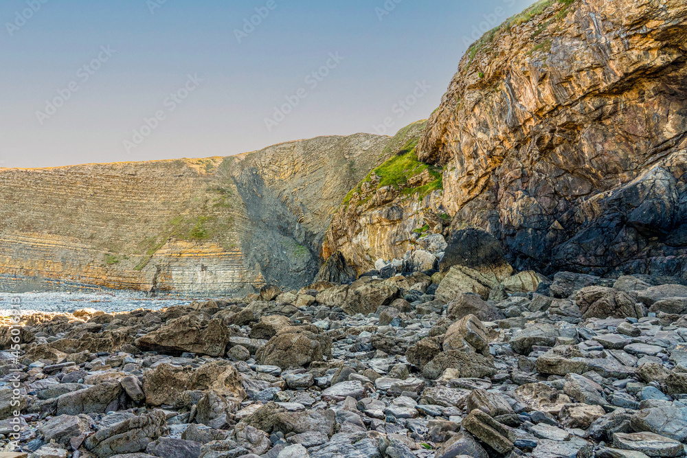 cliff rock fall onto the beach at Southerndown bridgend Wales a result of storms attributed to Climate change and coastal erosion