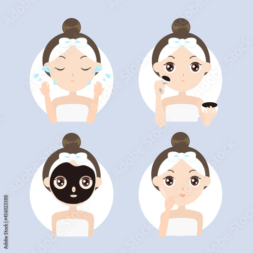 Beautiful Girl Applying a Black Clay Facial Mask